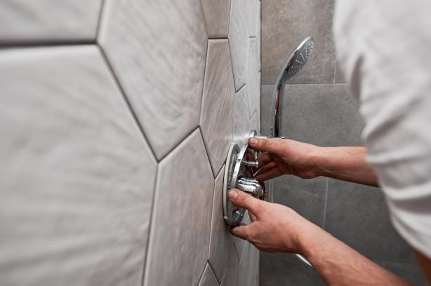 Fixture installations including sinks, showers, and toilets